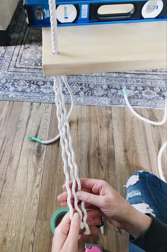 creating tassels from cotton rope at the bottom of diy indoor swing