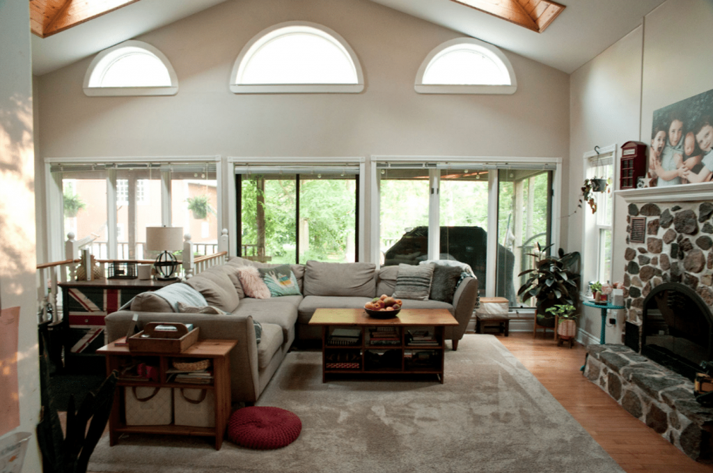 family room with floor to ceiling windows